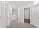 Upstairs hallway with view of the walk-in closet and stairs at 448 Berryman Rd, Rock Hill, SC 29732