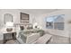 Serene bedroom featuring a luxurious bed with decorative pillows and ample natural light at 448 Berryman Rd, Rock Hill, SC 29732
