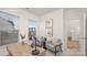 Bright office with a wood desk, two chairs and bright windows providing natural light at 448 Berryman Rd, Rock Hill, SC 29732