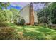 Well-maintained backyard and garden with mature trees on an ample lot at 4501 Bainview Dr, Mint Hill, NC 28227