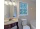 The bathroom has a vanity, a well-lit mirror, a toilet, and a bath tub at 4501 Bainview Dr, Mint Hill, NC 28227