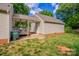 Attached garage featuring covered walkway to the main house at 4501 Bainview Dr, Mint Hill, NC 28227