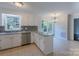 Well-lit kitchen featuring granite countertops, stainless steel appliances, and a breakfast bar at 4501 Bainview Dr, Mint Hill, NC 28227