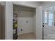 Utility room with tile floor, hot water heater and closet at 4501 Bainview Dr, Mint Hill, NC 28227