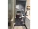 Stylish bathroom with black tiled floors, gray walls, and elegant white cabinets offers a modern aesthetic at 4561 N Wynswept N Dr, Maiden, NC 28650