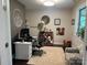 Bright home office with neutral walls, computer, desk, and window with view of outdoor nature at 4561 N Wynswept N Dr, Maiden, NC 28650