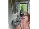 Cozy porch featuring comfortable seating and a hanging chair, perfect for relaxation and enjoying the outdoors at 4561 N Wynswept N Dr, Maiden, NC 28650
