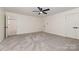 Bedroom with plush carpet has doorways to closet and bathroom at 503 Randa Dr, Statesville, NC 28625