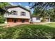 Split-level home with brick accents, white siding, and beautiful trees at 503 Randa Dr, Statesville, NC 28625