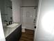 Bathroom featuring a granite countertop vanity and shower with black trim at 5751 Selkirk Dr, Hickory, NC 28601