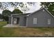 Charming one-story home featuring gray siding, a covered porch, and a well-maintained lawn at 602 Still St # 1 Blk C, Chester, SC 29706