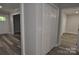 Hallway with a closet and vinyl plank flooring, leading to multiple rooms in the home at 602 Still St # 1 Blk C, Chester, SC 29706