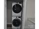 Laundry closet featuring a stacked washer and dryer with a counter at 602 Still St # 1 Blk C, Chester, SC 29706