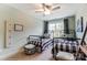 This adorable bedroom features two twin beds, plenty of natural light, and decorative accessories at 6266 Tea Olive Dr # 238, Harrisburg, NC 28075