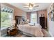 Cozy bedroom with natural light and a full-sized bed at 6266 Tea Olive Dr # 238, Harrisburg, NC 28075