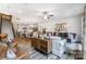 Open-concept living room flows into the kitchen and features lots of natural light and modern finishes at 6266 Tea Olive Dr # 238, Harrisburg, NC 28075