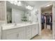 The bathroom includes a dual sink vanity and an entrance to the walk-in closet at 6842 Berewick Commons Pkwy, Charlotte, NC 28278
