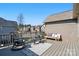Inviting deck featuring stylish outdoor seating, rug, and a clear blue sky at 6842 Berewick Commons Pkwy, Charlotte, NC 28278