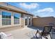 Outdoor deck features double doors, neutral siding and a modern lounge chair at 6842 Berewick Commons Pkwy, Charlotte, NC 28278