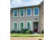 Two-story home features a welcoming exterior with well-maintained landscaping at 6842 Berewick Commons Pkwy, Charlotte, NC 28278
