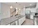 Stylish kitchen island with stainless steel appliances and pendant lighting at 6842 Berewick Commons Pkwy, Charlotte, NC 28278