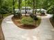 Circular driveway and landscaping provide a grand approach to the residence at 6868 St Peters Ln, Matthews, NC 28105