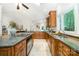 Open concept kitchen featuring stainless steel appliances, stylish counters, and sleek cabinets at 6868 St Peters Ln, Matthews, NC 28105