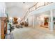 Spacious living room boasts high ceilings, grand staircase, and elegant architectural details at 6868 St Peters Ln, Matthews, NC 28105