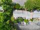 A bird's eye view of townhomes with dedicated parking spaces and mature landscaping in a neighborhood in Charlotte, NC at 8835 Hunter Ridge Dr, Charlotte, NC 28226