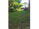 A spacious backyard with lush green grass and mature trees offering privacy at 8835 Hunter Ridge Dr, Charlotte, NC 28226