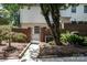 The fenced in backyard features a sidewalk, an AC unit, and an entrance gate at 8835 Hunter Ridge Dr, Charlotte, NC 28226