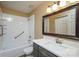 Bathroom featuring a combined shower and tub with a vanity at 8835 Hunter Ridge Dr, Charlotte, NC 28226
