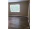 Cozy bedroom with great natural light and newly installed floors at 8835 Hunter Ridge Dr, Charlotte, NC 28226