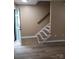 Welcoming foyer with staircase and wood-look floors at 8835 Hunter Ridge Dr, Charlotte, NC 28226