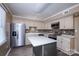 Modern kitchen with stainless steel appliances and a center island at 8835 Hunter Ridge Dr, Charlotte, NC 28226