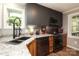 Modern kitchen boasts stainless steel appliances, granite countertops, and ample cabinet space at 8903 New Town Rd, Waxhaw, NC 28173