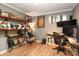 Versatile room can serve as an office, offering shelving, desk space, and ample lighting at 8903 New Town Rd, Waxhaw, NC 28173