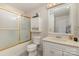Cozy bathroom with a shower-tub combination and a vanity with modern fixtures at 910 E Center Ave, Mooresville, NC 28115