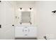 Modern bathroom with double sink vanity, white cabinets, stylish fixtures, and contrasting wood-look floors at 9423 Weston Woods Ln, Charlotte, NC 28216