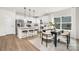 Bright kitchen with stainless steel appliances and dining area at 9423 Weston Woods Ln, Charlotte, NC 28216