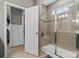 Beautifully designed bathroom featuring a glass shower and easy access to an adjacent room at 9620 Fire Bellied Ct, Lancaster, SC 29720
