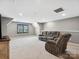 Cozy bonus room featuring carpet floors, neutral walls, and comfortable seating at 9620 Fire Bellied Ct, Lancaster, SC 29720