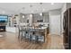 Stylish kitchen with stainless steel appliances, a center island, and gray cabinetry at 9620 Fire Bellied Ct, Lancaster, SC 29720