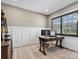 Bright office space featuring wainscoting, wide-plank wood floors, and ample natural light at 9620 Fire Bellied Ct, Lancaster, SC 29720