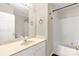 Bathroom with a shower and tub combo, vanity with a mirror and modern fixtures at 9916 Meadowmead Ct # 17, Charlotte, NC 28273