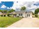 A beautiful ranch home is complemented by a driveway and lush green lawn at 9916 Meadowmead Ct # 17, Charlotte, NC 28273