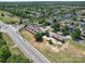 Aerial view of the Bonterra community stables, with surrounding neighborhood and trees at 1020 Equipoise Dr, Indian Trail, NC 28079