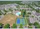 An aerial view of the Bonterra community pool, tennis court, and recreation areas at 1020 Equipoise Dr, Indian Trail, NC 28079