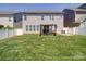Well-maintained backyard with a pergola and outdoor seating area at 1020 Equipoise Dr, Indian Trail, NC 28079