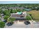 A beautiful aerial view of the Bonterra clubhouse and pool with the tennis court nearby at 1020 Equipoise Dr, Indian Trail, NC 28079